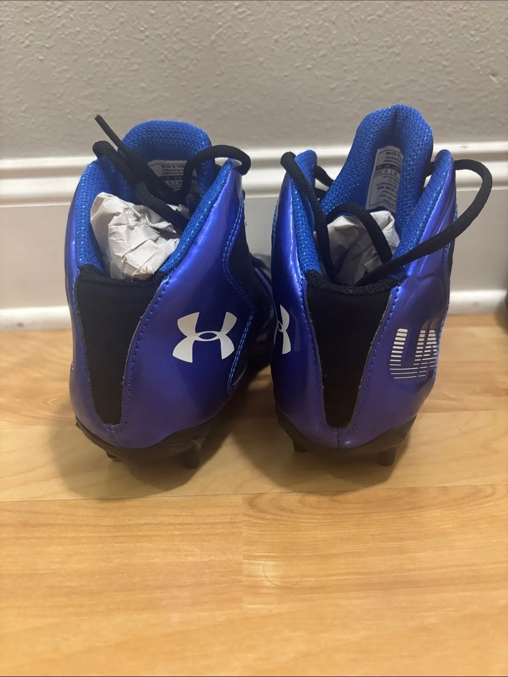 Under Armour Kids Black and Blue Football Cleats